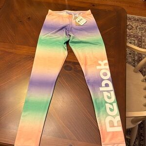 Multi colored Reebok leggings. Never worn!